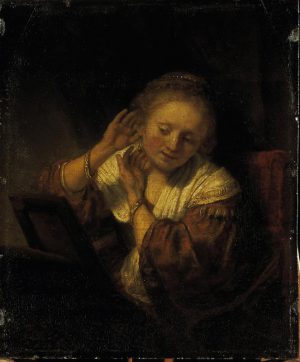 Rembrandt “Junge Frau sich mit Ohrringen schmückend“ 32.5 x 39.5 cm